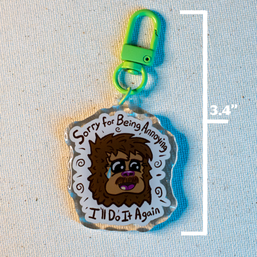 Keychain with Freddie the Yeti surrounded by the words "Sorry for Being Annoying, I'll Do It Again"