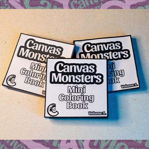 Three 'Canvas Monsters' mini coloring books on a white surface.