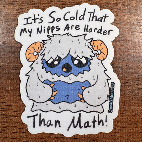 A sticker depicting a cartoon character resembling a yeti with a humorous text about it being so cold that the character's nipples are harder than math.