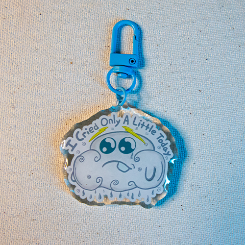 Keychain with Nimby the cloud raining and the words "I Cried Only A Little Today"