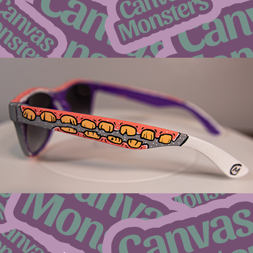 Side view of painted sunglasses with a teeth pattern