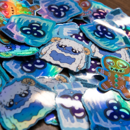 A close up of a Collection of colorful cartoon-style stickers on a wooden surface