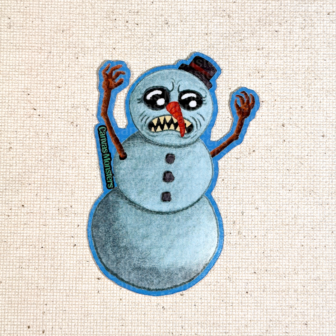 Glossy sticker of a monster snowman on a textured beige background