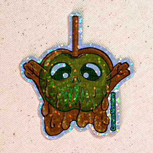 Holographic sticker of a cartoon candy apple character on a beige background