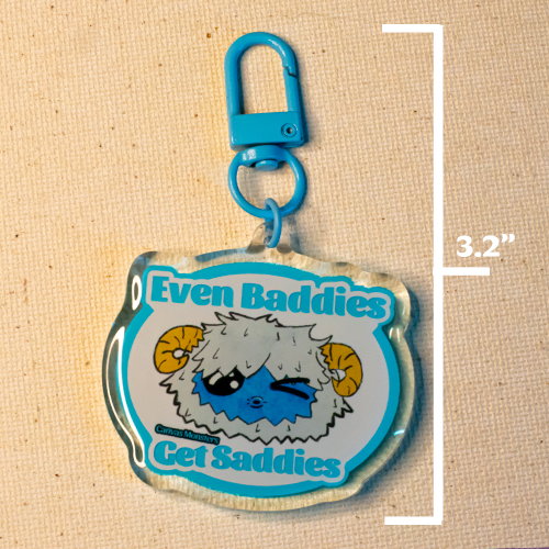 Keychain with Eddie the Yeti winking. Text reads "Even Baddies Get Saddies"