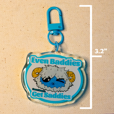 Keychain with Eddie the Yeti winking. Text reads "Even Baddies Get Saddies"
