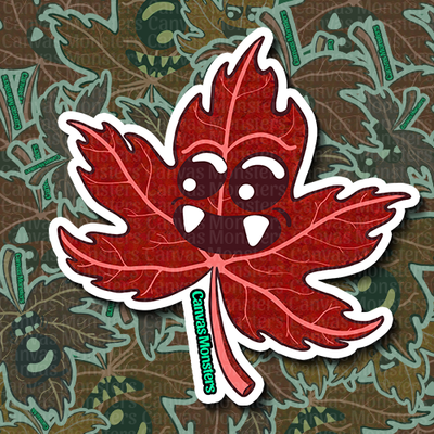 Red maple leaf monster sticker with white outline on a patterned background
