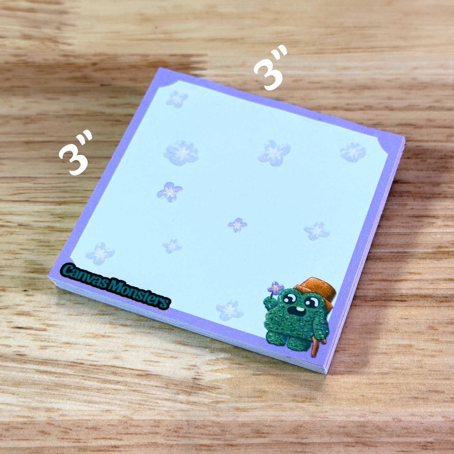 3x3 inch sticky notepad with a purple border, floral background, and a shrub cartoon character in the bottom right corner.