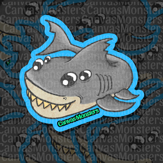 A cartoon shark sticker with a bright blue outline and the text 'CanvasMonsters' on the lower part, shown on a dark patterned background with repeated CanvasMonsters watermark text.