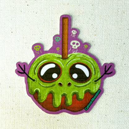 Glossy sticker of an apple-shaped character with green poisin dripping over it on a beige background.
