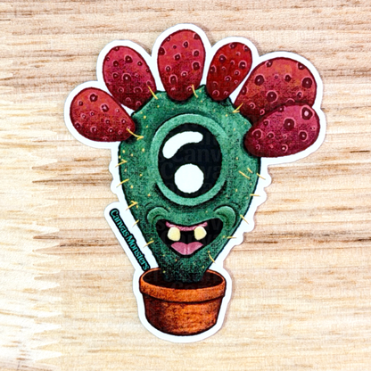 Cartoon cactus with red flowers on a wooden surface