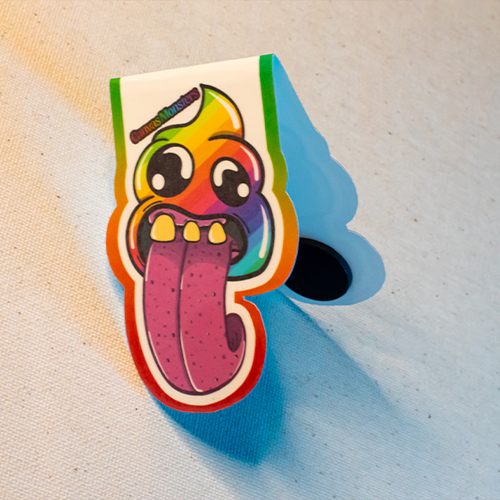 Magetic bookmark featuring Canvas Monsters character "Rainbow Deuce" with its tongue sticking out.