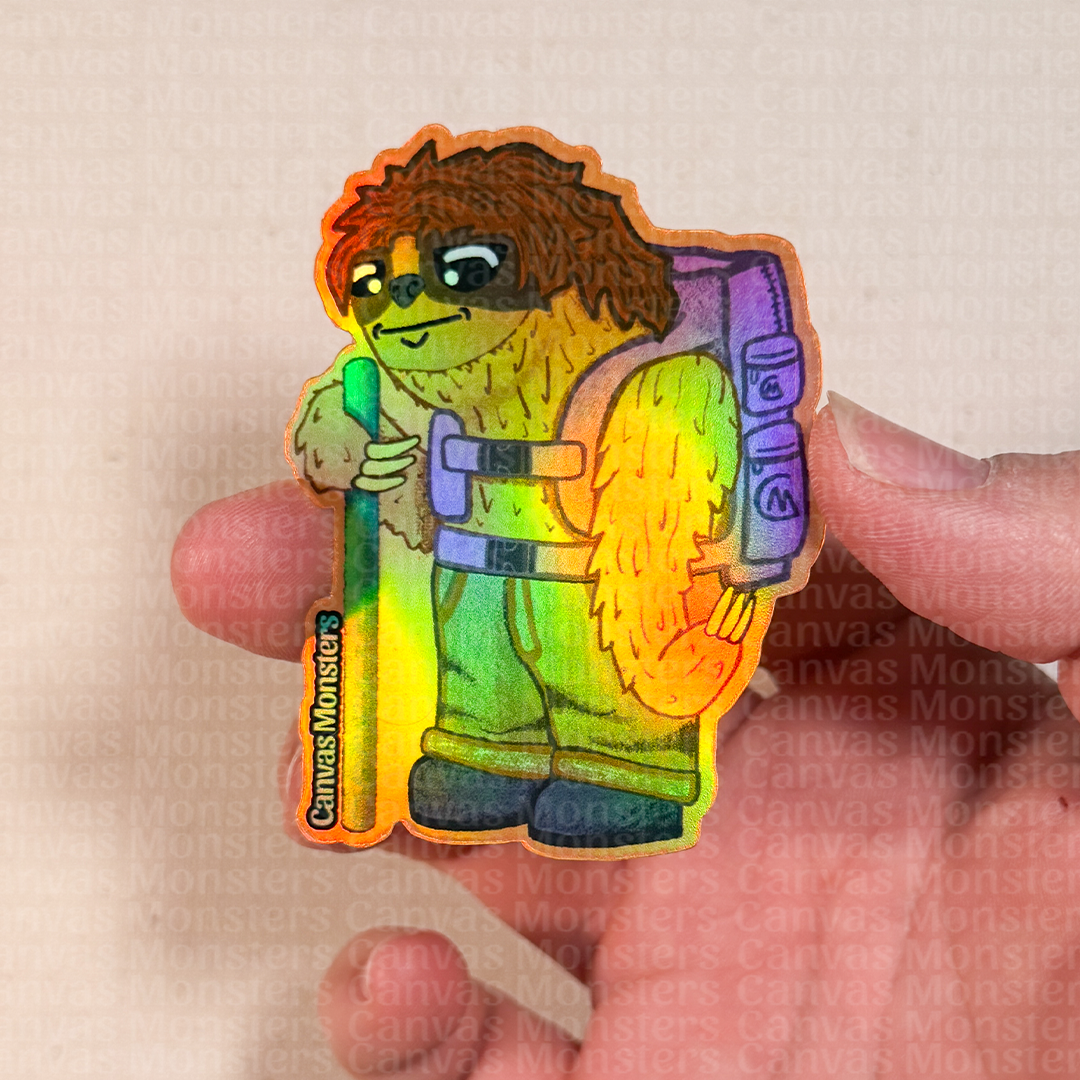 Holofoil sticker of a sloth character with a backpack and a pole on a textured beige background