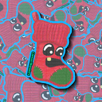 Red stocking with cartoon face on a patterned background