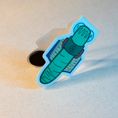 Back of a magnetic bookmark featuring a bookworm character reading a book.