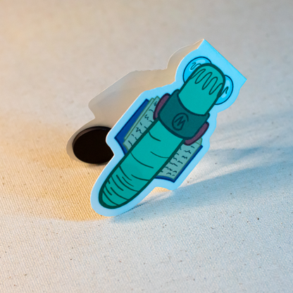 Back of a magnetic bookmark featuring a bookworm character reading a book.