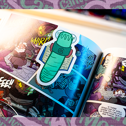 Magnetic bookmark in a graphic novel, showing the back of the bookworm design