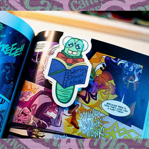 Magnetic bookmark featuring a bookworm character reading a book titled, "World's Okayst Novel"