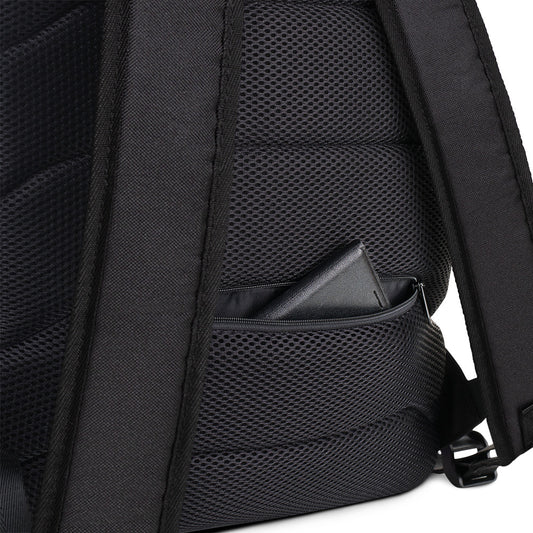 Close-up of a black backpack with a pocket on a white background