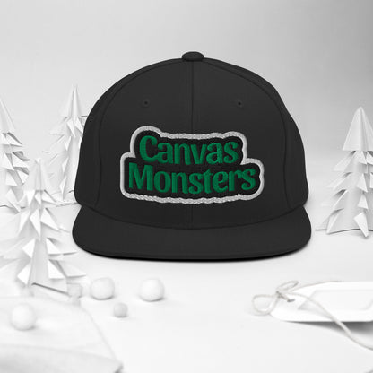 Black cap with 'Canvas Monsters' text on a white background