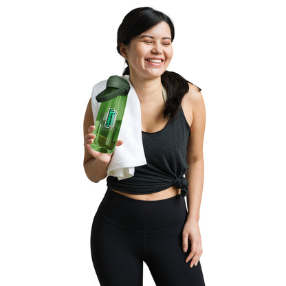 Smiling woman with black hair wearing gym attire holding a green Camelbak water bottle.