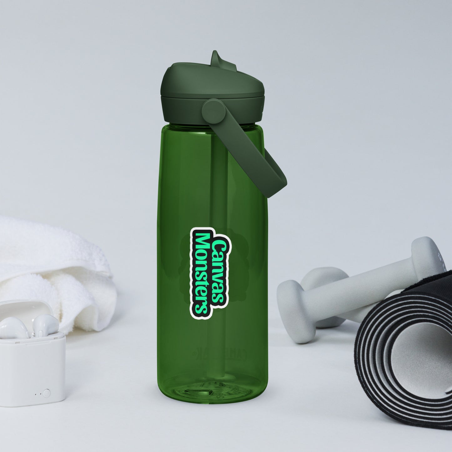 Green water bottle with 'Canvas Monsters' logo on a white background