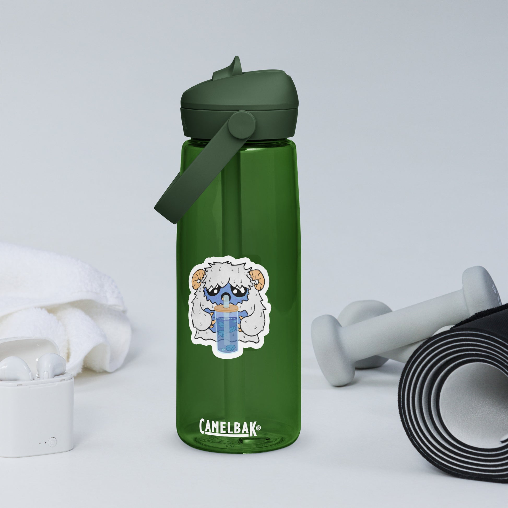 Green CamelBak water bottle with a cartoon character sticker on a white background