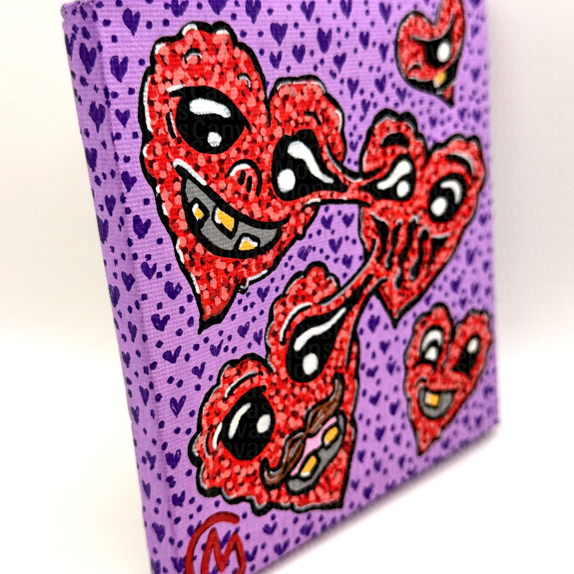 Painting on canvas depicting five red hearts, three of which are melted into one another. Each heart has a unique face, painted on a purple background. Painting is sitting on a white background.