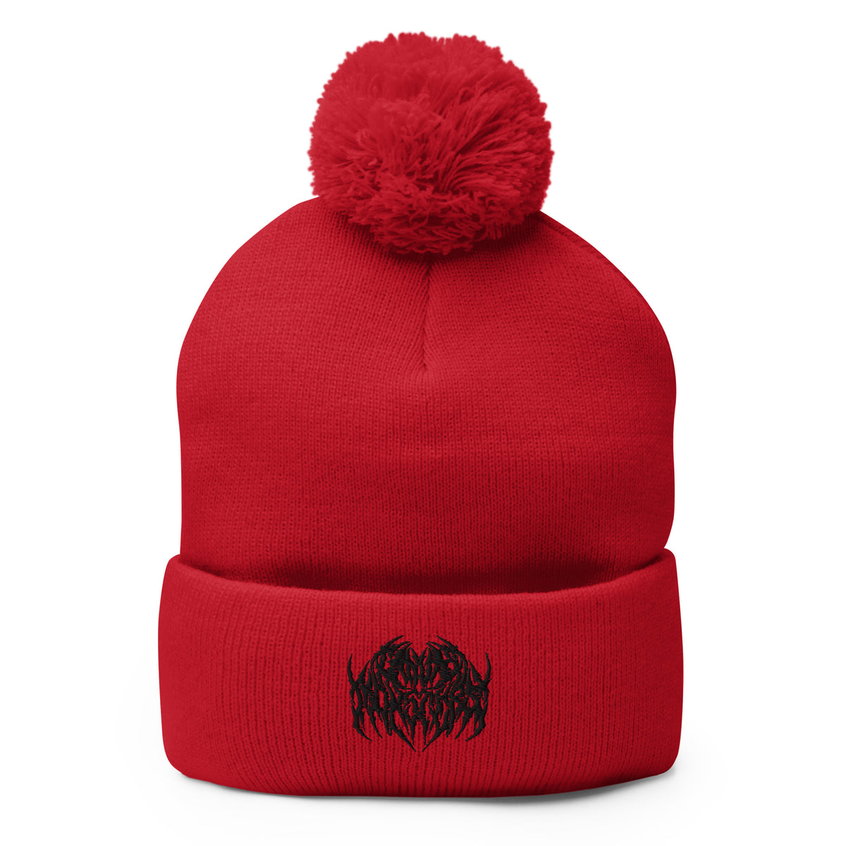 Image of a knit beanie with a pom pom on top, in solid red with a metal text logo on the front.