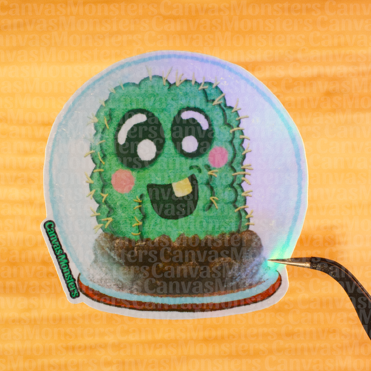 Holofoil sticker of a cartoon cactus character in a globe on a wooden background
